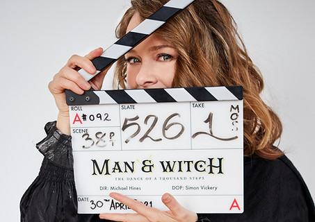 Tami and clapper Board.jpg